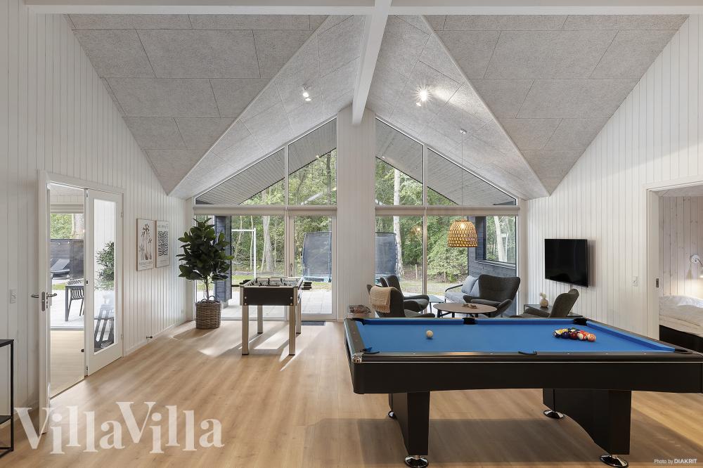 Neben den vielen schönen Stunden, die man im Poolbereich des Hauses verbringen kann, bietet das Luxusferienhaus 973 auch Spielevergnügen bei Billard/Tischtennis und Darts
