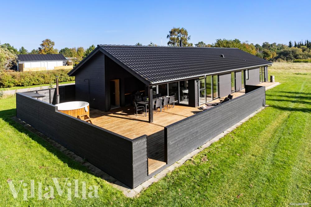 Diese schicke Haus mit Whirlpool Nr. 1029 mit Platz für 12 Personen liegt in Nordjütland