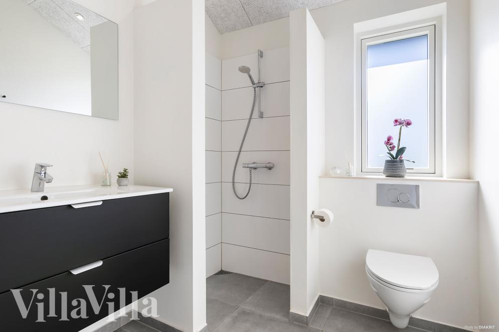 Eines der Badezimmer im Luxusferienhaus Nr. 1029