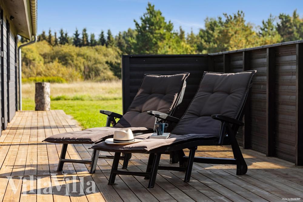 Genießen Sie einen Grillabend auf der Terrasse des Luxusferienhauses Nr. 1029 in Nordjütland