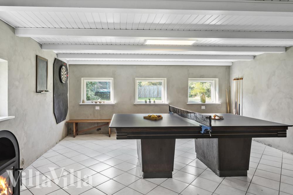 Neben den vielen schönen Stunden, die man im Poolbereich des Hauses verbringen kann, bietet das Luxusferienhaus 1016 auch Spielevergnügen bei Billard/Tischtennis und Darts