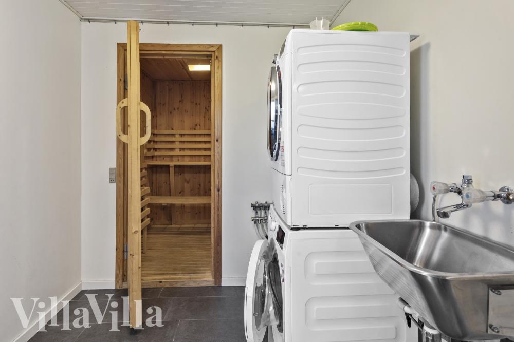 Genießen Sie die heiße Sauna im Luxusferienhaus Nr. 1016 für 14 Personen