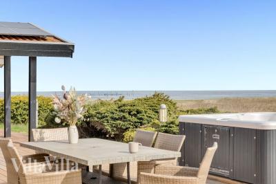Dieses schöne Poolhaus Nr. 1024 mit Platz für 12 Personen liegt in Südjütland