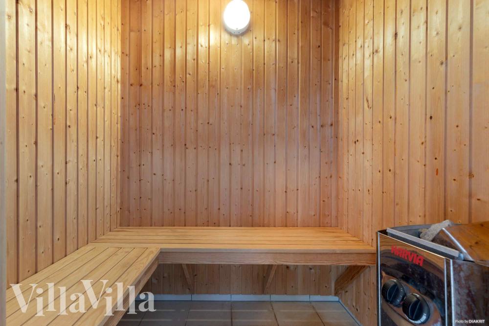 Genießen Sie die heiße Sauna im Luxusferienhaus Nr. 335 für 24 Personen