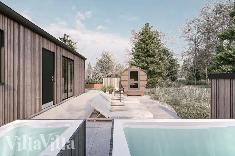 Genießen Sie den warmen Whirlpool im Luxusferienhaus Nr. 1017 in Ostjütland