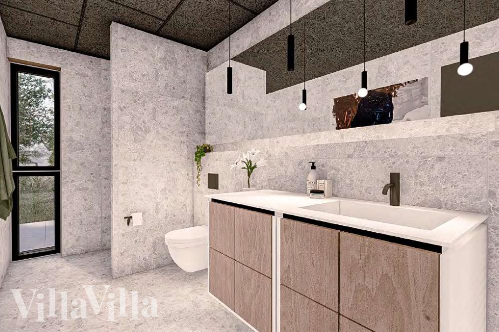 Eines der Badezimmer im Luxusferienhaus Nr. 1017