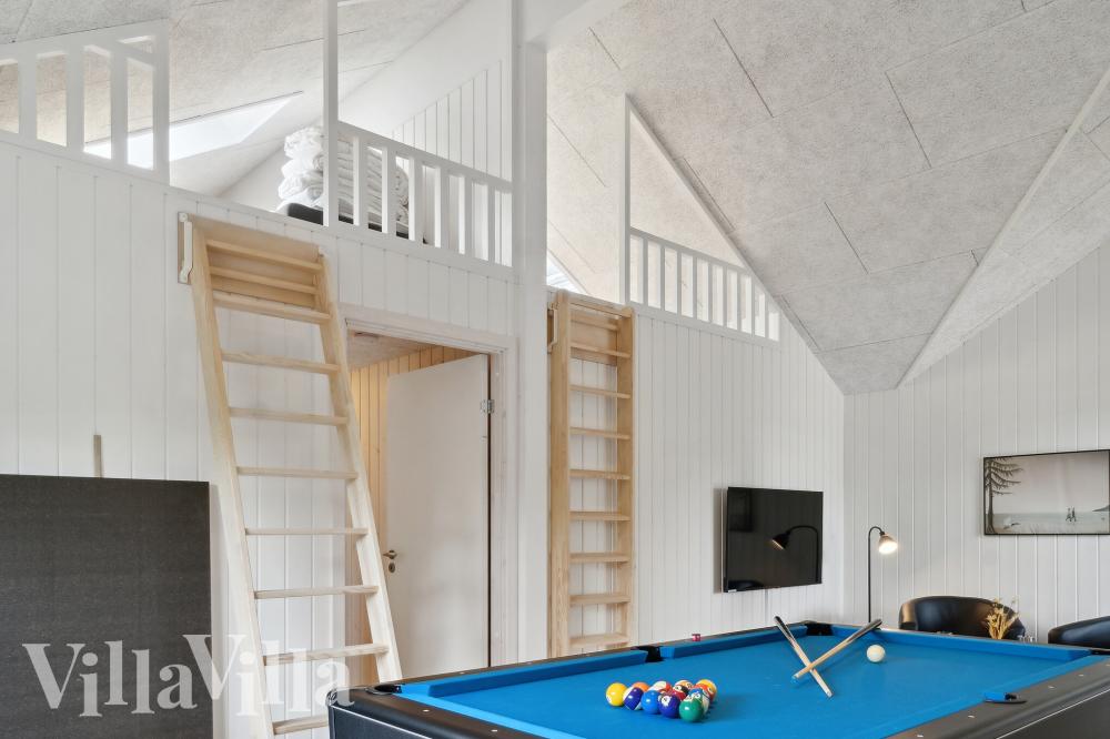 Das Luxusferienhaus 1026 für 14 Personen hat einen großen Aktivitätsraum mit u. a. Billard und Darts