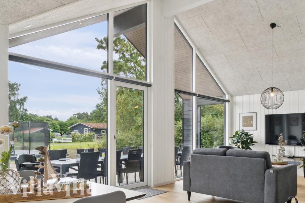 Die Couch im Luxusferienhaus Nr. 1026 in Fünen und seine Inseln lädt zu Gesellschaftsspielen oder zu Kinoabenden ein.