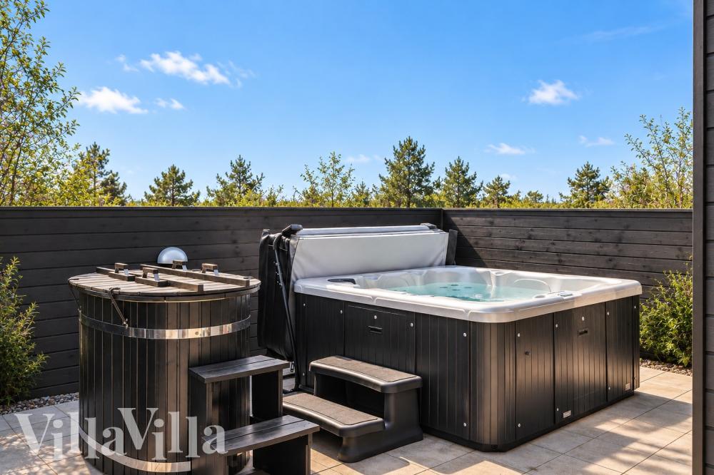Genießen Sie den warmen Whirlpool im Luxusferienhaus Nr. 1004 in Lolland/Falster/Mön
