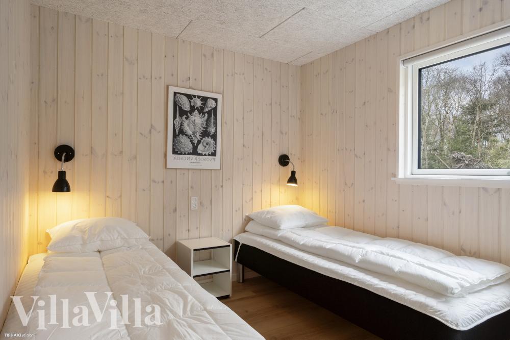 Eines der 7 Schlafzimmer im Luxusferienhaus Nr. 1021